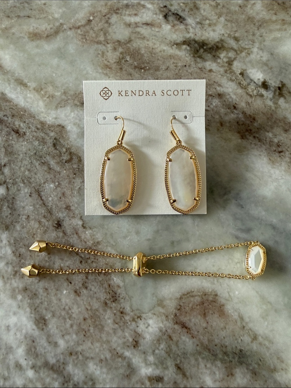Kendra Scott earrings and bracelet